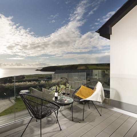 Sit out on the home's terrace and watch the clouds float on by over the sea