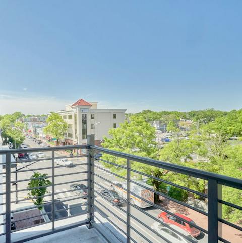 Sit out on the home's expansive balcony and watch the city go about its business