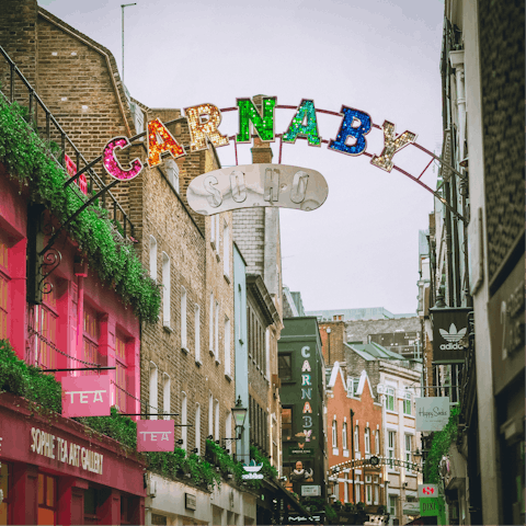 Explore Soho before shopping along Carnaby Street, a five-minute walk away 