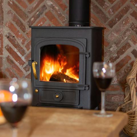 Cosy up next to the wood burning stove