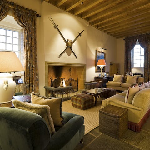 Get toasty around the fire in the historic living room