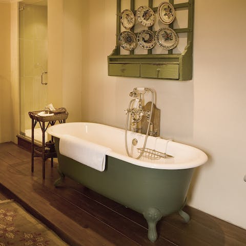 Soak in the antique bath, then rinse off under the power shower