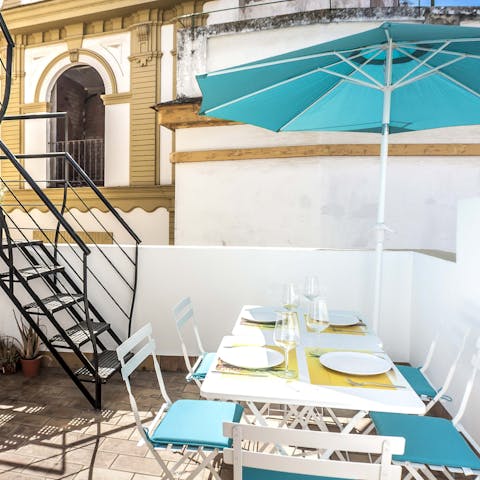 Gather together on the outside dining terrace for lunch in the sun