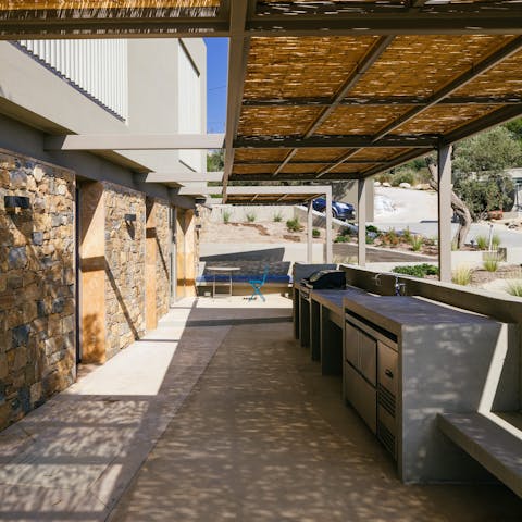 Whip up some bifteki in the outdoor kitchen and dine alfresco