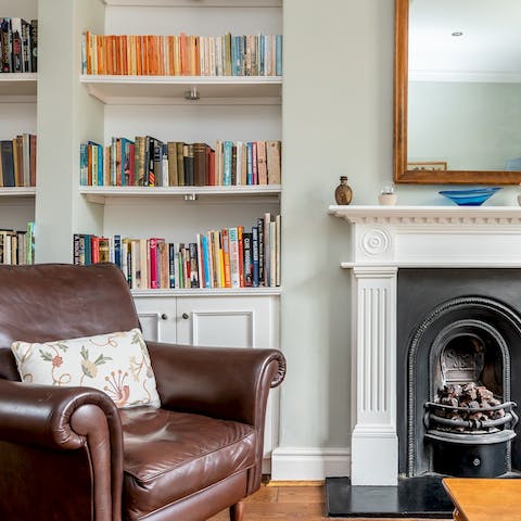 Get lost in a good book in front of the fireplace
