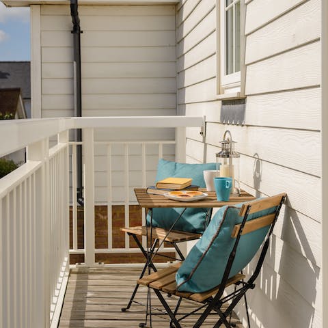 Enjoy a quiet moment on the private balcony