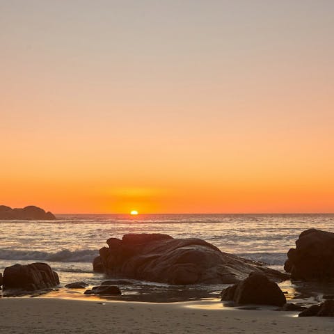 Catch the sunset at Clifton 4th Beach – just seconds away on foot