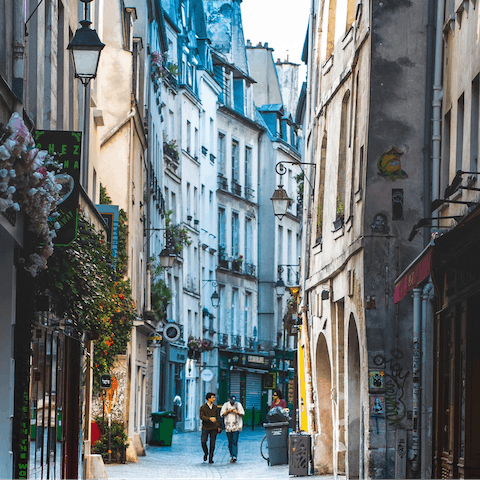 Explore the trendy streets of Le Marais, filled with boutiques, art galleries and hip bars