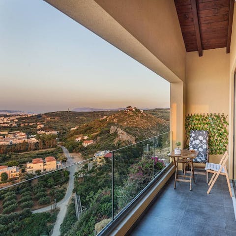 Get up early to watch the sun rising over the village with a cup of coffee