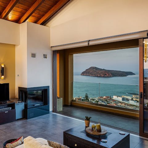 Enjoy spectacular ocean views while you get cosy by the fireplace