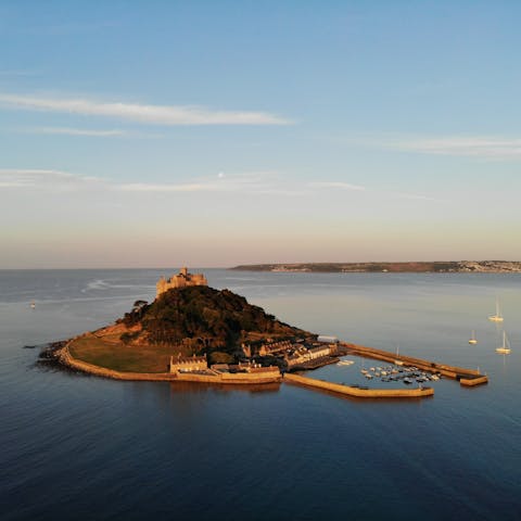 Visit St Michael's Mount, a twelve-minute drive away