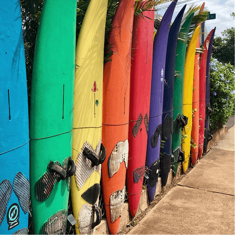 Hone those board skills with tuition from a local surf school