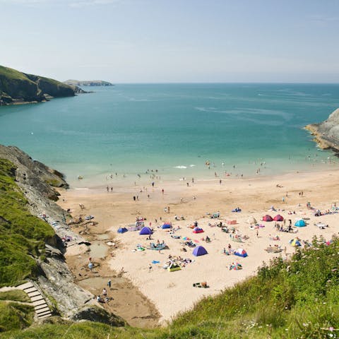 Hit the sand at New Quay Beach