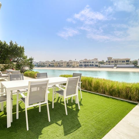 Enjoy luqaimat by the private beach and clear waters of Palm Jumeirah