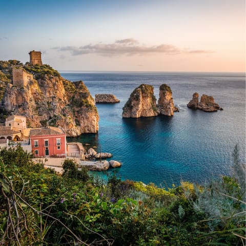 Discover the beautiful mountains and beaches of Sicily's east coast