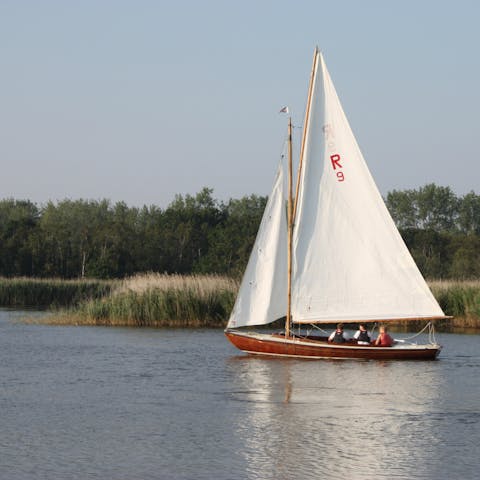 Drive fifteen miles north and discover the tranquility of sailing on the Norfolk Broads