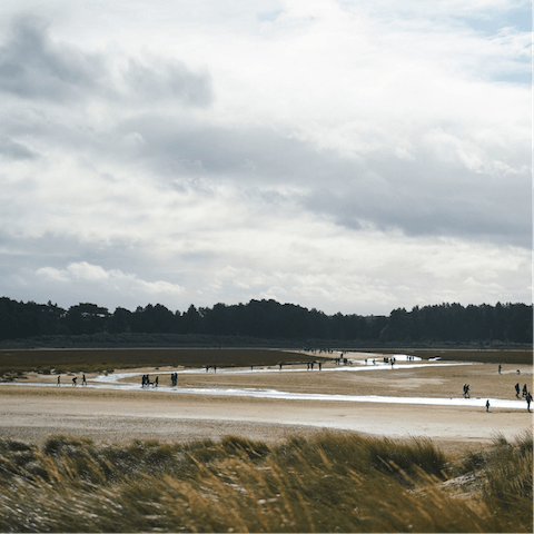 Spend the day beachcombing on Holkham Beach, a twenty-minute drive away