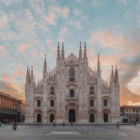 Visit the beautiful Duomo di Milano, a seven-minute walk away