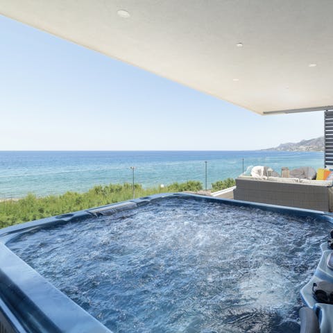 Hop into the jacuzzi with views over the Mediterranean
