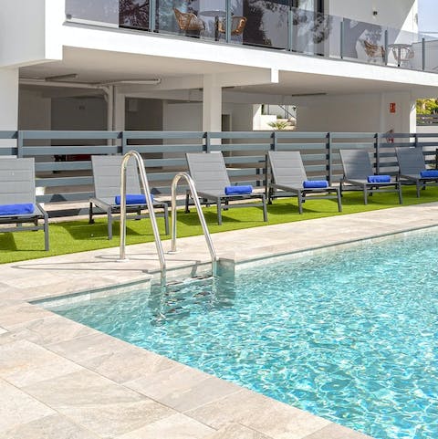 Have a refreshing swim in the communal pool
