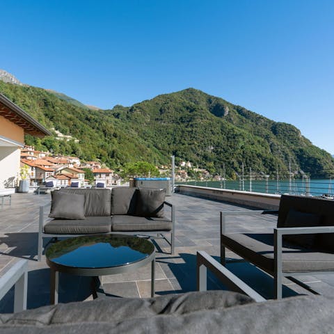 Sit back with a glass of wine and admire the waterfront views
