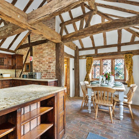 Gather friends and family around the kitchen table in this incredible historic home