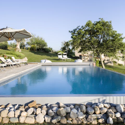 Enjoy the Tuscan sun from the cool of the private swimming pool