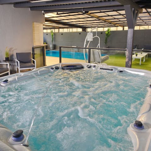Relax in the hot tub or by the indoor pool during rain or shine