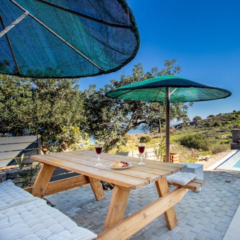 Sit down to an alfresco feast amongst the olive trees