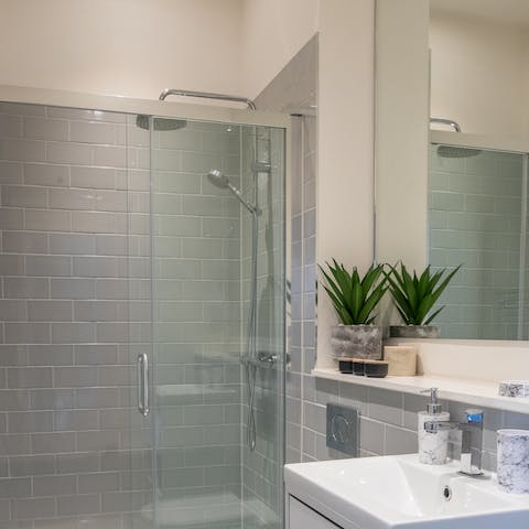 Start mornings with a luxurious soak under the bathroom's rainfall shower