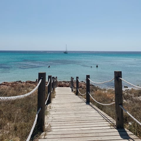 Explore Ibiza's famous beaches, including a two-minute walk to Cala Codolar