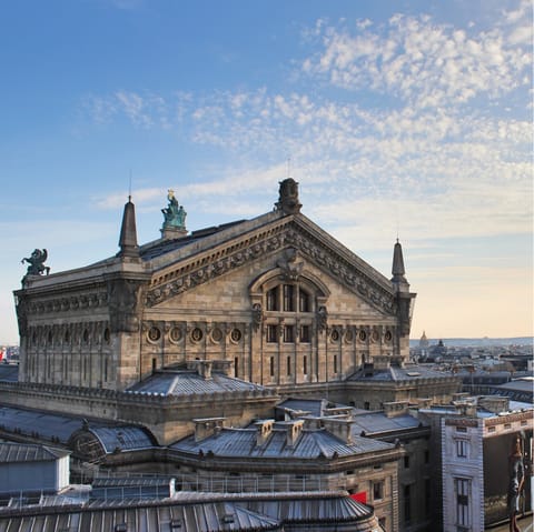 Admire the beauty of Paris' Opéra Garnier, a twenty-three-minute walk away