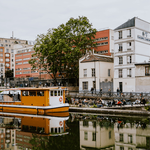 Enjoy Canal Saint-Martin's waterside cafés, a fifteen-minute stroll from your door