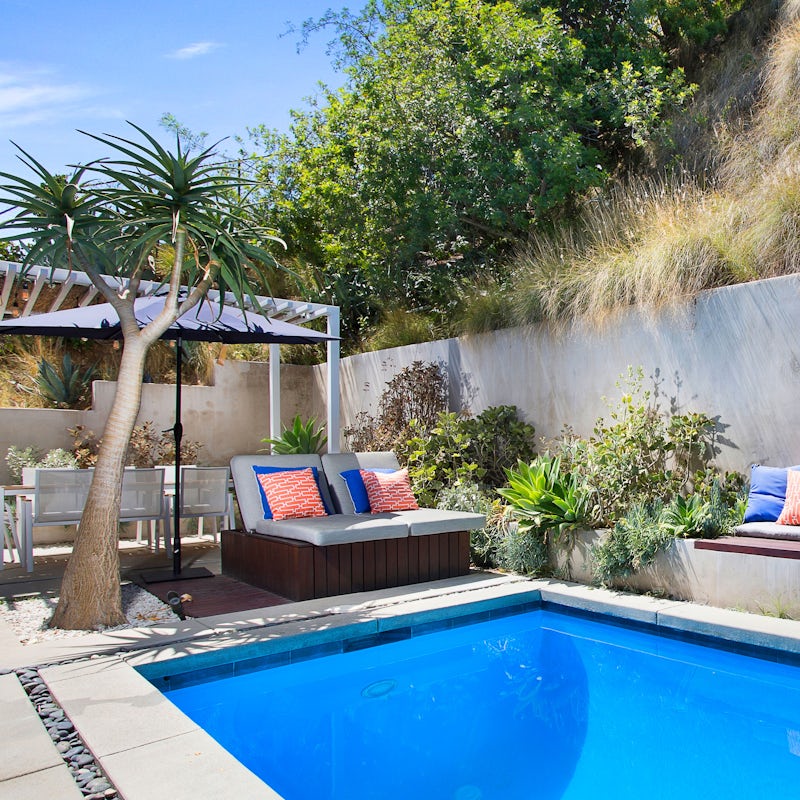 Sunbathe on the day beds around the pool