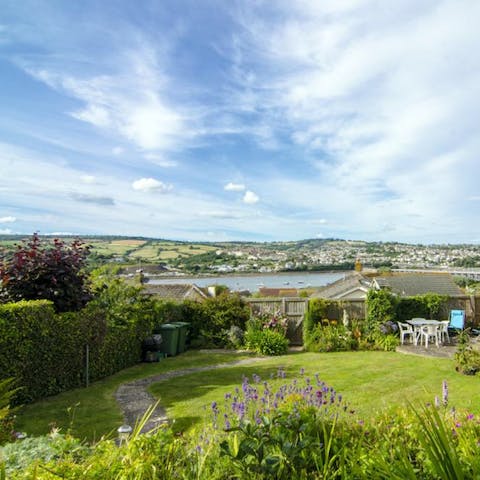 Marvel at views of the River Teign from your back garden