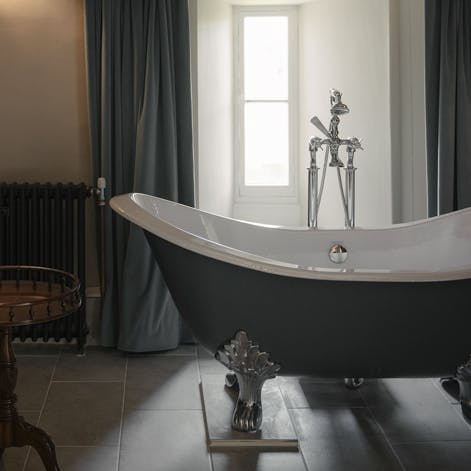 Indulge yourself with a bubbly bath in the clawfoot bathtub