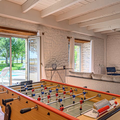 Challenge your loved ones to a game of table football after long days of exploring the French countryside