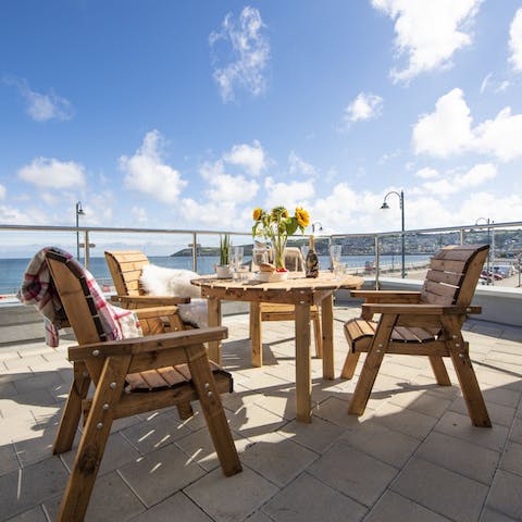 Enjoy dining alfresco morning, noon and night on the south-facing balcony