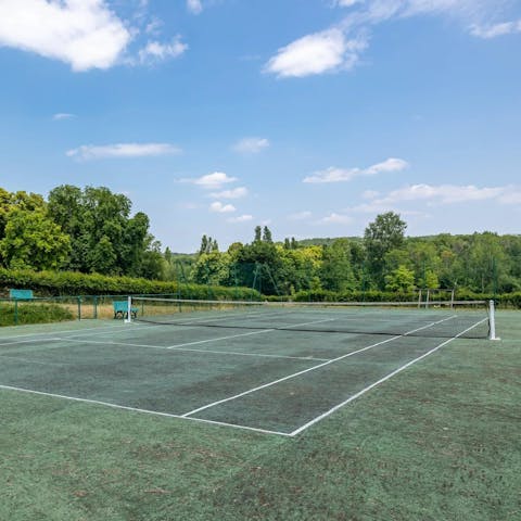 Stay active in the vast grounds on the private tennis court