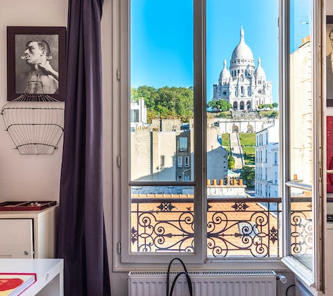 Take in unbeatable views of the Sacré Coeur from your bedroom