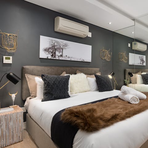 Unwind in the stylish bedroom after a day exploring everything Cape Town has to offer