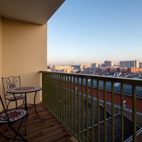 Enjoy your morning coffee on the private balcony while taking in skyline views