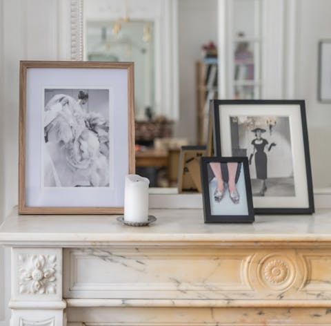Female icons on the mantelpiece