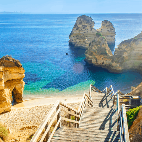 Explore the beaches and coves nestled along the Algarve coastline