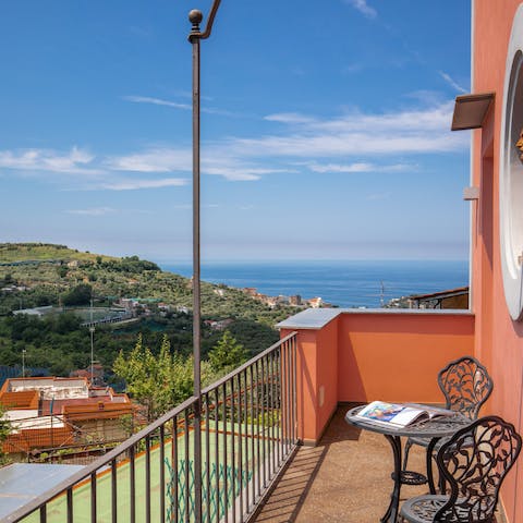 Sip cappuccino on the balcony and drink in the view of the Bay of Naples