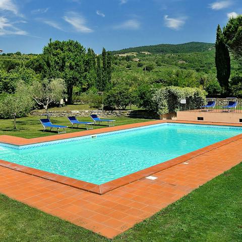 Enjoy refreshing dips in the communal swimming pool
