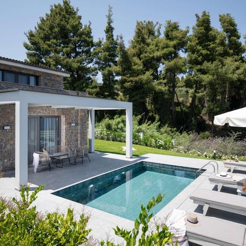 Plunge into your private pool, or read on the sun loungers all day