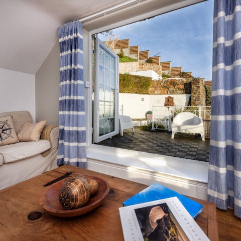 Throw open the huge doors in the living room and let the sea breeze in