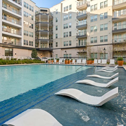 Chill out by the outdoor swimming pool