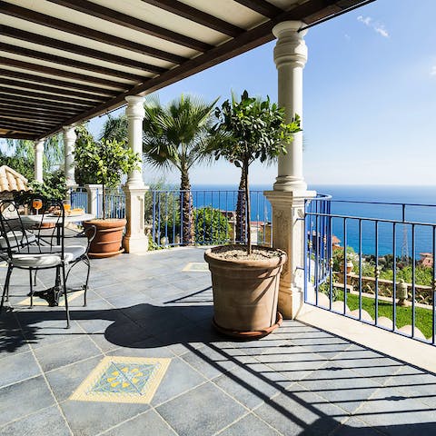 Gaze out at the Mediterranean Sea from one of the balconies